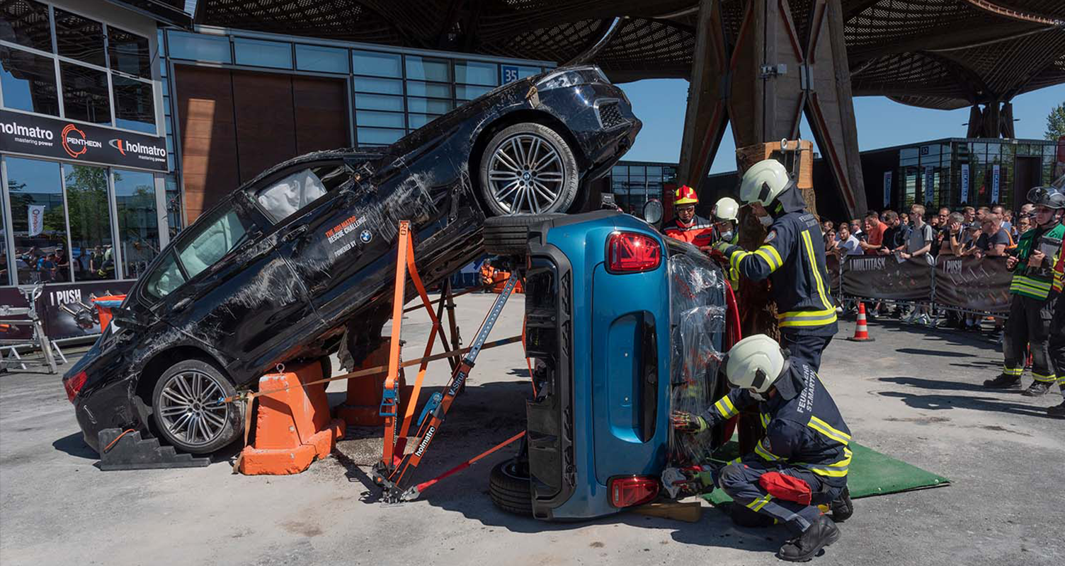 Two BMWs in a simulated road traffic collision during the Holmatro Rescue Challenge 2022