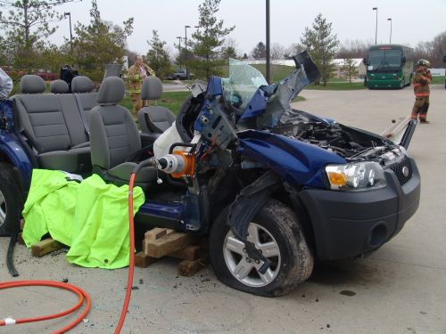 Dash lift performed on Ford SUV Hybrid. By following safety guidelines extrication rescue can be safely performed on hybrids..JPG