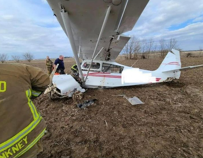 A one-seated aircraft after it crashed in muddy terrain
